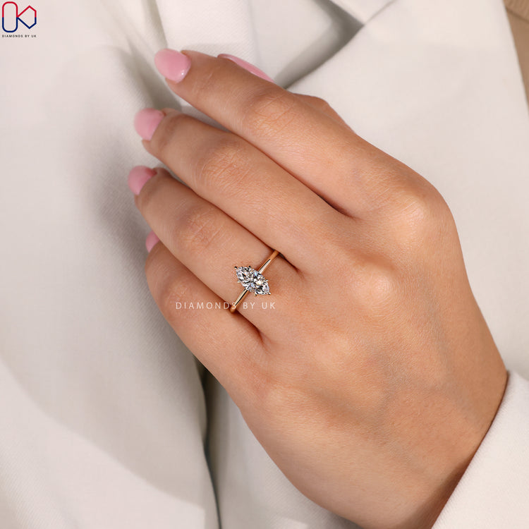 Round cut hidden halo ring with a six claw prong setting.
