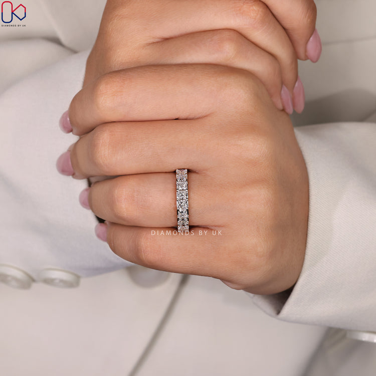Diamond half eternity band with a unique channel set design.
