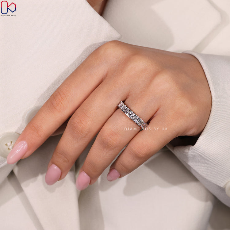 Handmade ring featuring a channel set eternity band for a luxurious touch.
