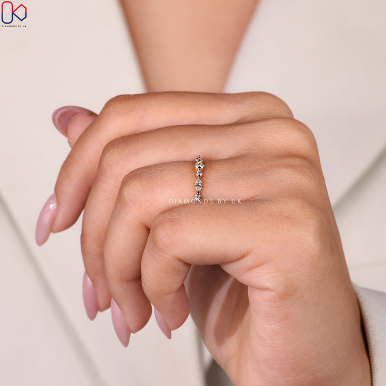 Yellow gold eternity band showcasing warmth and luxurious craftsmanship.
