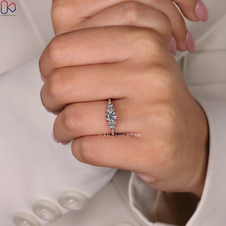 Round Side Stone Engagement Ring for a classic look.
