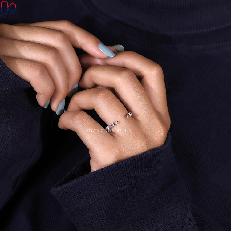 A Diamondsbyuk band featuring a modern open gap design and lab grown diamonds.