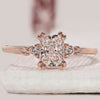 Radiant cut diamond engagement ring with 5 stone engagement ring.
