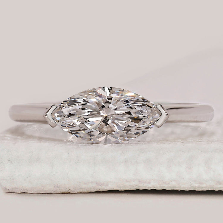 East west marquise diamond engagement ring in white gold.
