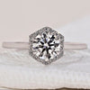 Round Cut Diamond Ring in a classic halo ring design.
