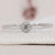 Solitaire Diamond Ring with a round cut diamond.
