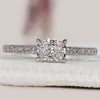 East West ring with radiant cut diamond in white gold.
