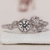 Diamond cluster engagement ring in white gold.
