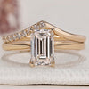Solitaire ring with matching wedding band in yellow gold.
