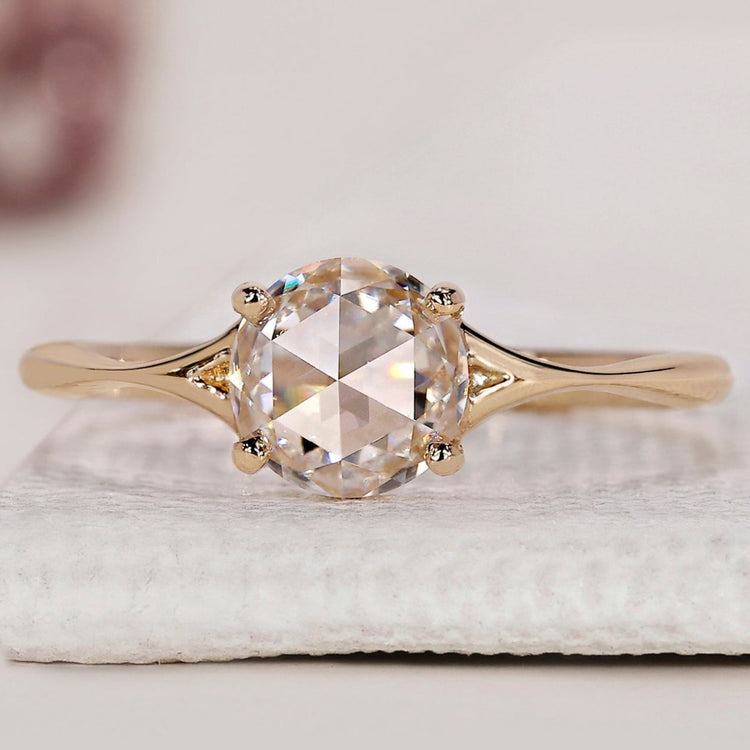 Antique rose cut diamond engagement ring handcrafted in yellow gold with a split shank design.