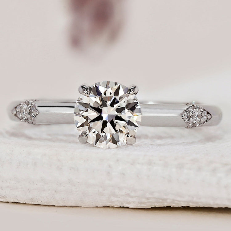 White Gold Diamond Engagement Ring with a round diamond.
