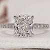 Cushion cut engagement ring with hidden halo ring.
