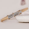 Yellow gold diamond wedding band featuring a sleek and elegant design.
