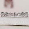 Half Eternity Wedding Band in white gold with sparkling diamonds.
