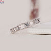 Handmade jewellery includes round diamond wedding band and custom detail.
