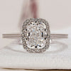 Radiant cut engagement ring with sparkling diamonds.