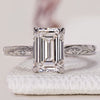 Emerald Diamond Ring featuring an Emerald Cut and side diamonds for an elegant engagement look.
