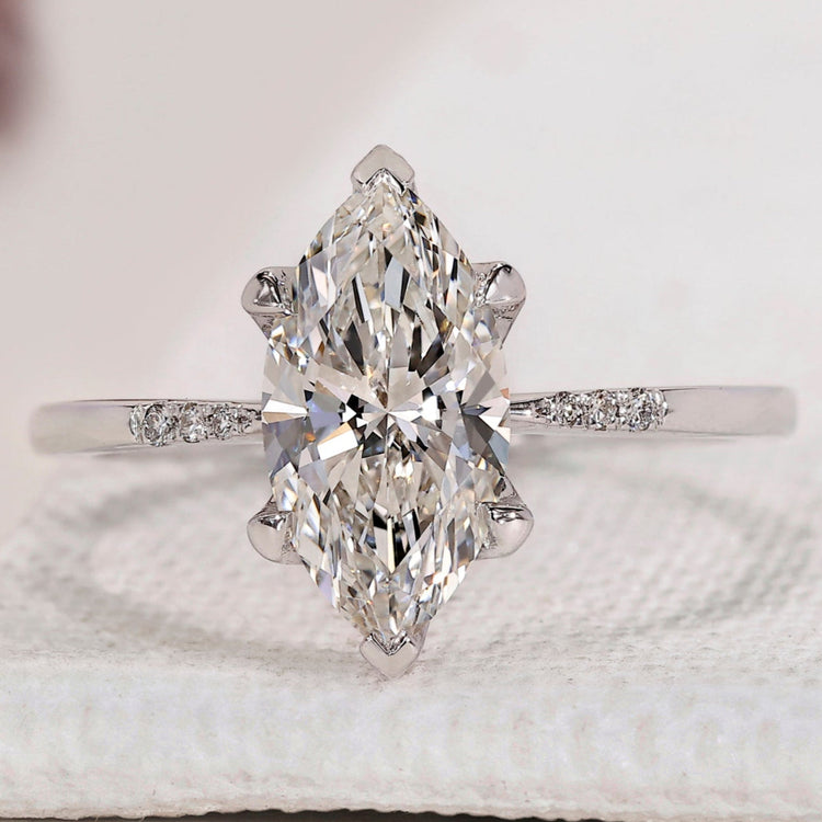 Marquise Diamond Engagement Ring with Round Side Accents