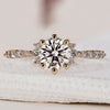 Diamond cluster ring with a stunning muse setting.

