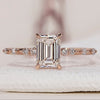 Emerald cut engagement ring with a classic design.