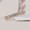 Round diamond wedding band offering a beautiful display of elegance.