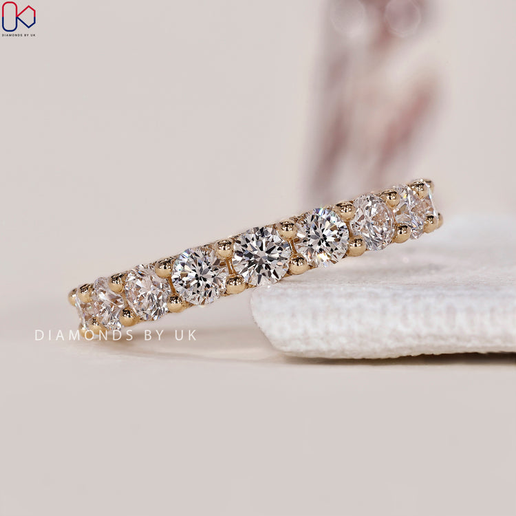 Round diamond wedding band offering a beautiful display of elegance.