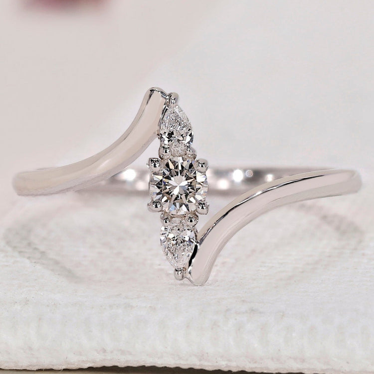 Round and Pear 3 Stone Diamond Ring