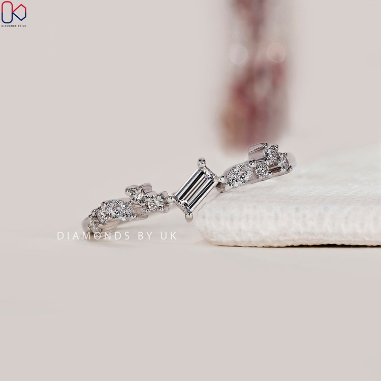 Diamondsbyuk band with white gold diamond band finish.
