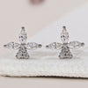 Floral stud earrings with sparkling diamonds for a timeless look.
