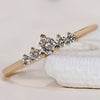 A stunning 5 stone diamond band crafted with exquisite detail in yellow gold.
