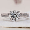 Round Diamond Engagement Ring set in a twisted band engagement ring design.
