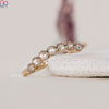 yellow gold wedding band paired with curved wedding band
