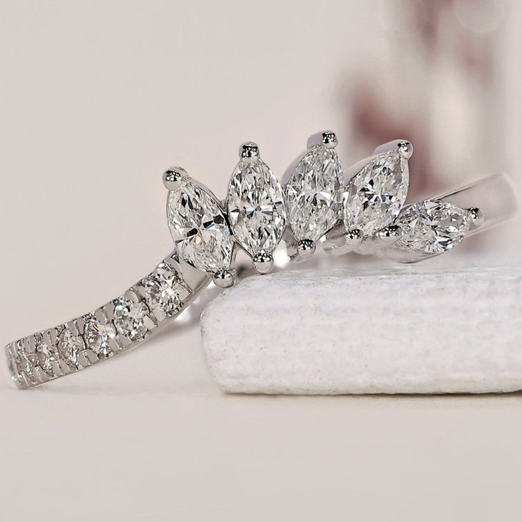 Tiara wedding band featuring a stunning marquise wedding band design.
