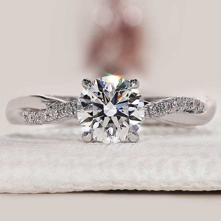 Round Cut Diamond Ring With Twisted Pave Setting