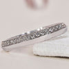 Elegant knife edge wedding band with a sleek and timeless design.
