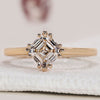 Asscher cut engagement ring in a solitaire setting.
