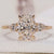 3 Stone Diamond Engagement Ring featuring a stunning oval diamond ring with marquise side stones.
