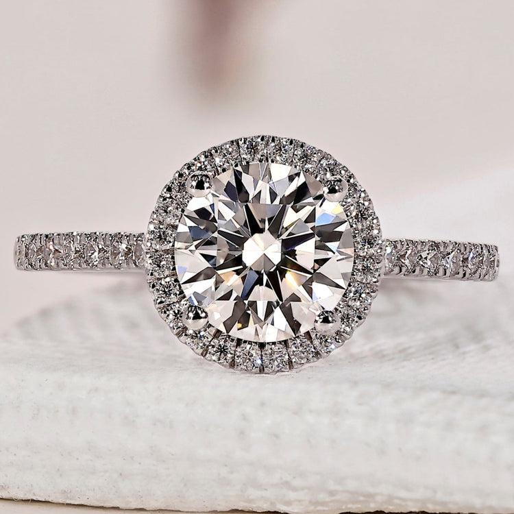 White gold engagement ring with a sleek, classic design.
