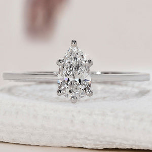 Solitaire Pear Shaped Diamond Ring In White Gold