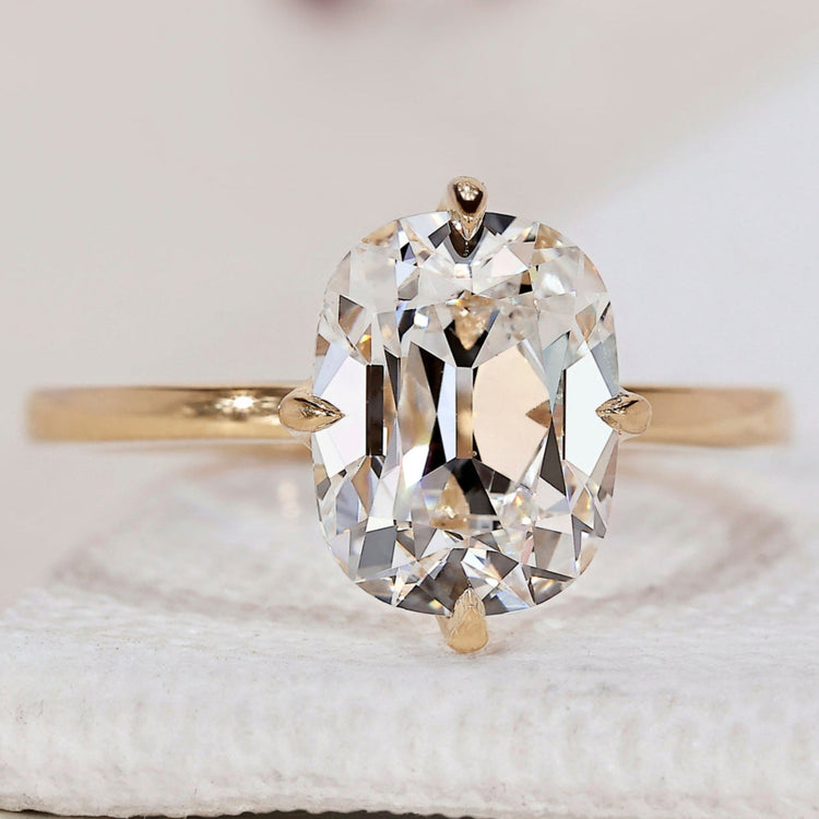 Elongated Cushion Cut Diamond Ring in a sleek setting.