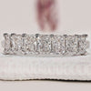 Radiant cut diamond band set in elegant white gold.
