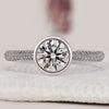 Bezel Set Engagement Ring with round diamond engagement ring.
