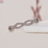 Customise wedding band in twisted design with lab grown stones.
