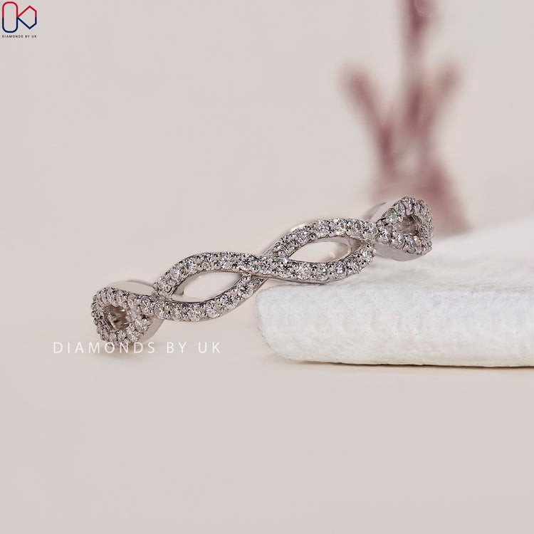 Customise wedding band in twisted design with lab grown stones.
