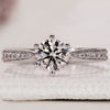 White gold diamond ring with a classic design.
