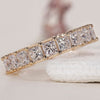 Princess cut eternity band with sparkling diamonds for timeless elegance.
