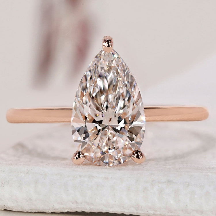 Pear Solitaire Engagement Ring with a brilliant sparkle.
