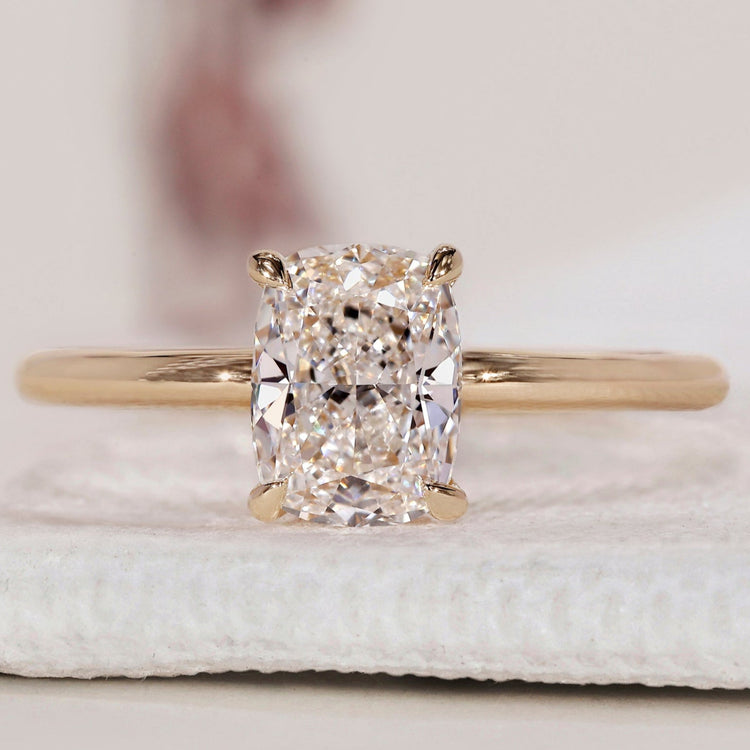 Elongated Cushion Cut Diamond Ring in a timeless design.
