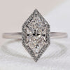 Dutch Marquise Engagement Ring with a stunning halo diamond design.
