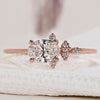 East west engagement ring with an oval diamond design.
